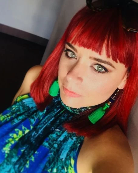 Stylish Bob Haircuts with Bangs 11 10. Long Red Hair Bob Cut With Bangs