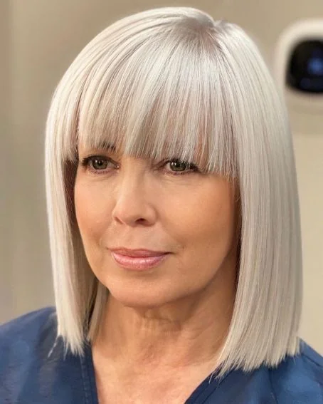 Stylish Bob Haircuts with Bangs 14 13. Long Blonde Bob With Bangs