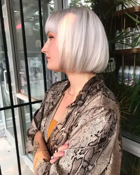 Stylish Bob Haircuts with Bangs 20 19. Blonde Hair Short Blunt Bob With Bangs